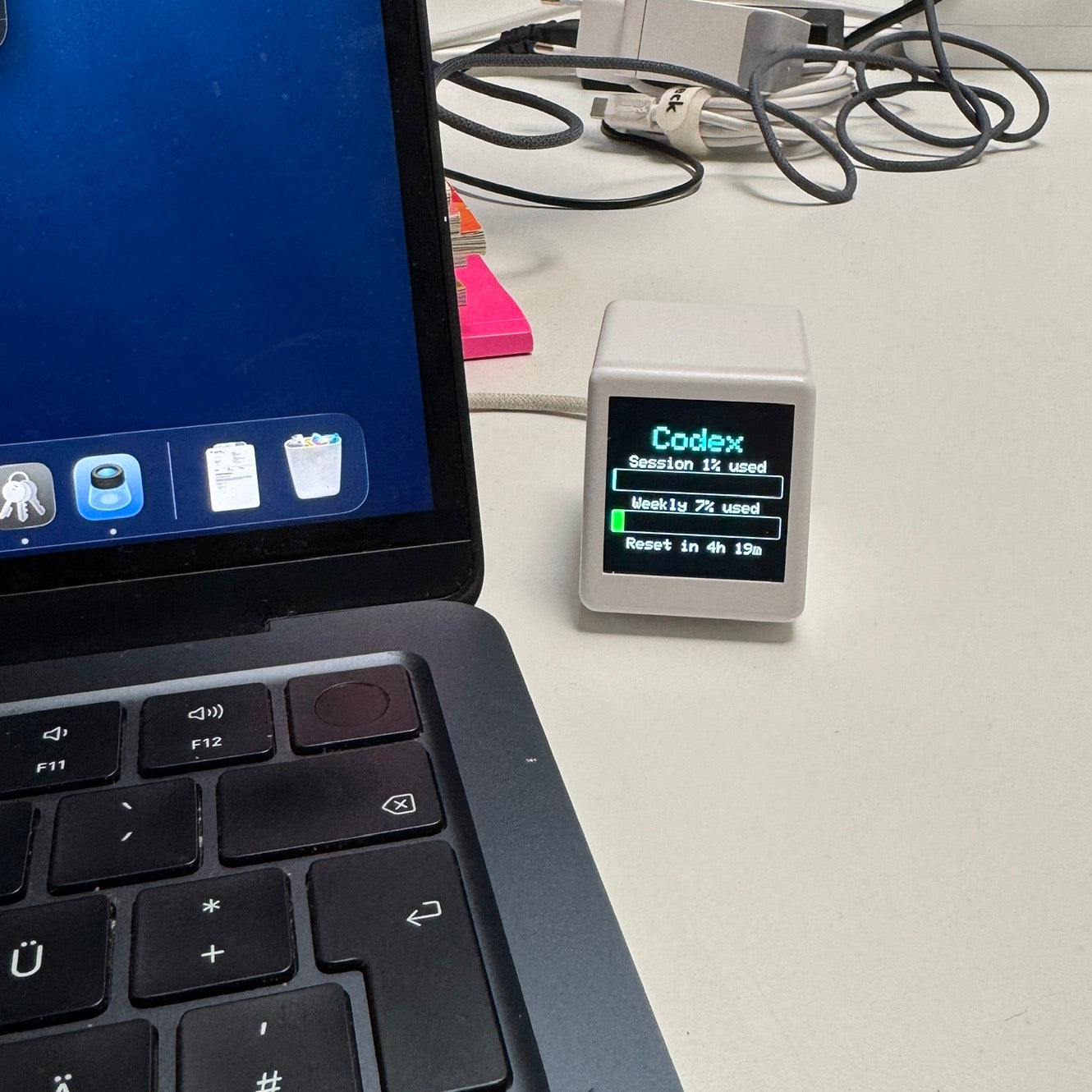 Customer desk photo with Vibe TV at the edge of a monitor